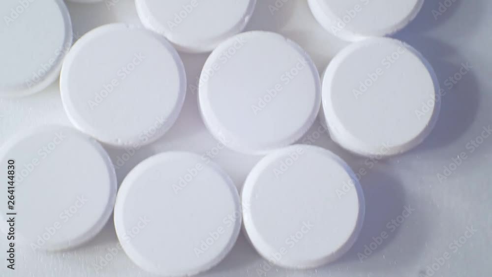 large round tablets on a light surface large round tablets on a light surface