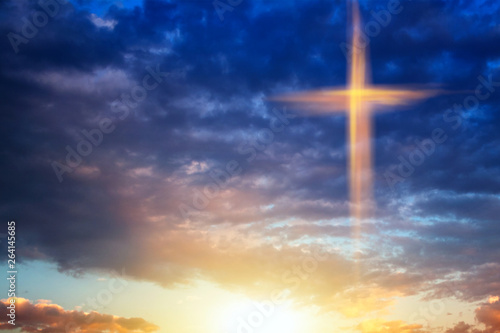 Religion symbol shape .  Dramatic nature background  , Glowing cross in sky . Happy Easter. Light from sky . Religion background .  Paradise heaven . Light in sky . #264145685