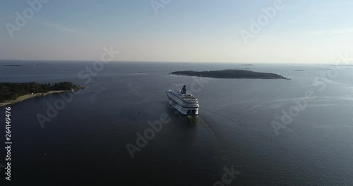  Summer evening aerial video of Helsinki Baltic Sea Finnish Bay lagoon area. Cruise liner ship depart to Tallinn. Near capital of Finland Suomi, northern Europe