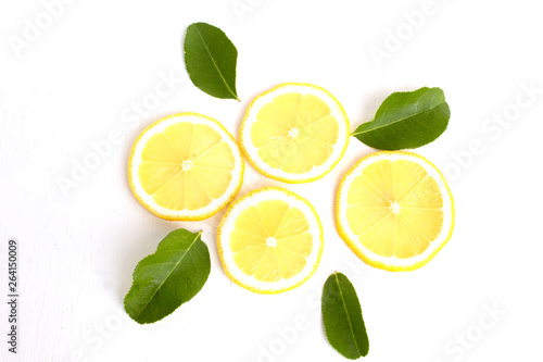 fresh lemon and leaves isolated on white background