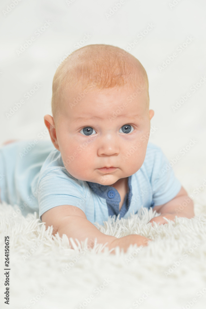 Portrait of beautiful baby boy on bed Portrait of beautiful baby boy on bed