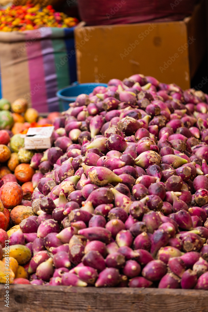 Purple fruits on a street market stand in Marrakesh, Morocco