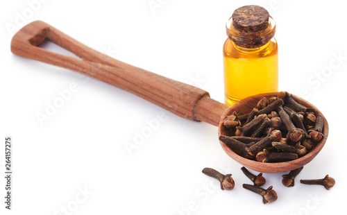 Fresh clove with oil in a jar photo