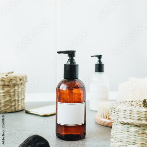 Spa bath composition with mockup copy space label tag on liquid soap bottle.