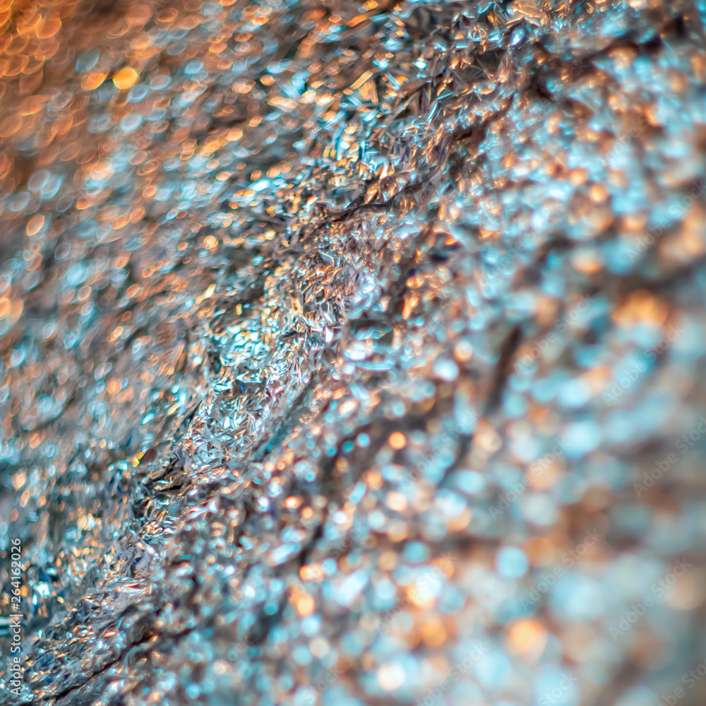 Abstract blur and defocused crumpled gray foil texture for background. Artistic colorful bokeh. Toned image does not focus. Pattern for poster, print. Abstract blur and defocused crumpled gray foil texture for background. Artistic colorful bokeh. Toned image does not focus. Pattern for poster, print.