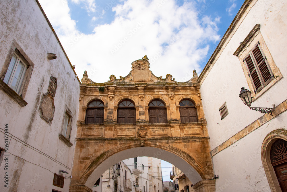 Italy, Ostuni, ancient passage between two houses