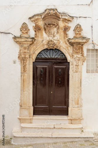 Italy, Ostuni, gate of an ancient building in the historic center © benny