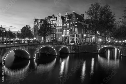 light up bridges over canals of Amsterdam at blue hour