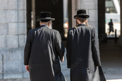 two jewish man in traditional clothes photo