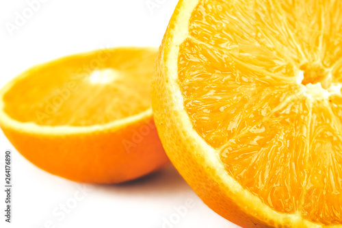 Orange fruit vegan on white background. Vitamin-C in natural form of fruit cut in half delicious.