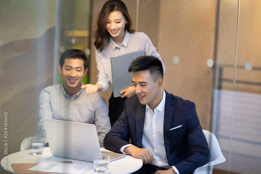 Confident business people talking in the office Confident business people talking in the office