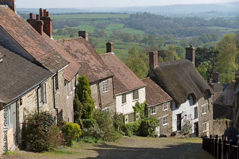 Shaftsbury, Dorset, England, UK. April 2019. Homes on the steep slope of Gold Hill in Shaftsbury, Dorset, UK a rural tourist attraction.