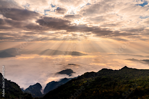 Sunrise with mist on hills 