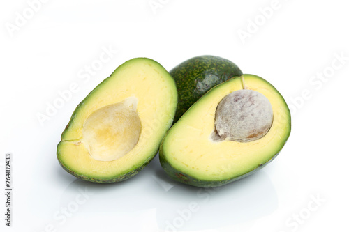 Young avocado isolate on white background  slice of fresh avocado  diet food concept