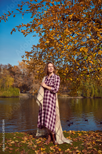 Lovely woman in autumn park