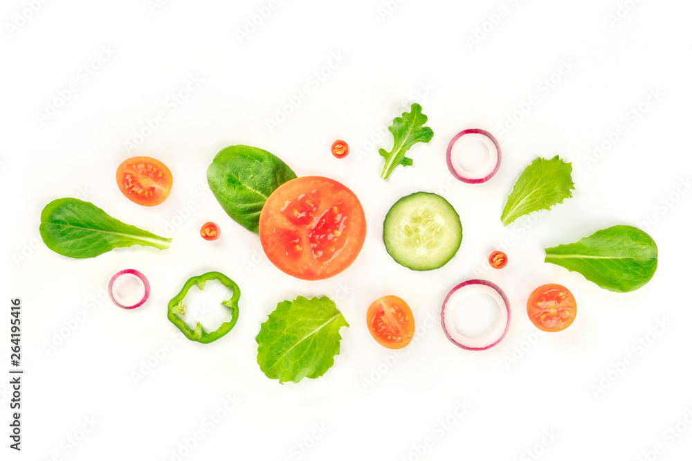 Fresh vegetable salad ingredients, shot from the top on a white background. A flat lay composition with tomato, cucumber, peppers, onion slices and mezclun leaves Fresh vegetable salad ingredients, shot from the top on a white background. A flat lay composition with tomato, cucumber, peppers, onion slices and mezclun leaves