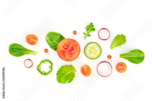 Fototapeta Naklejka Na Ścianę i Meble -  Fresh vegetable salad ingredients, shot from the top on a white background. A flat lay composition with tomato, cucumber, peppers, onion slices and mezclun leaves