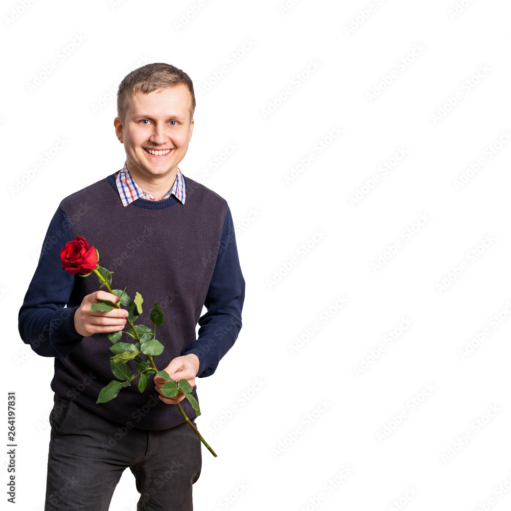 A young man with a rose in his hands, congratulates moms and women for a wedding, anniversary, another holiday. Isolated A young man with a rose in his hands, congratulates moms and women for a wedding, anniversary, another holiday. Isolated