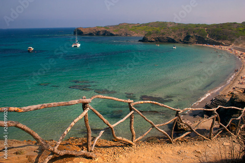 Beach and wood fence in Menorca