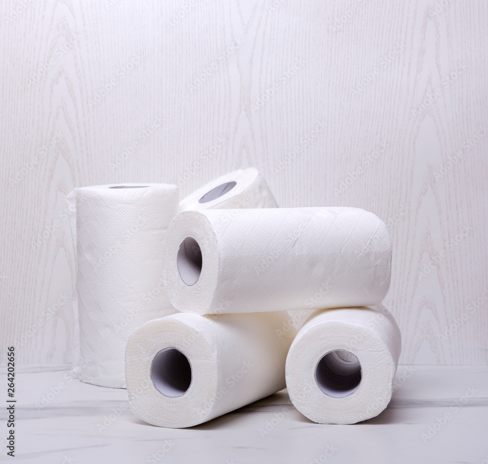 Stack of paper towels.White and soft rolled paper for cleaning the house Stack of paper towels.White and soft rolled paper for cleaning the house