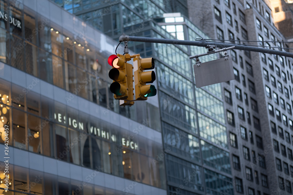 Red Traffic light with modern buildings in backgrounnd Red Traffic light with modern buildings in backgrounnd