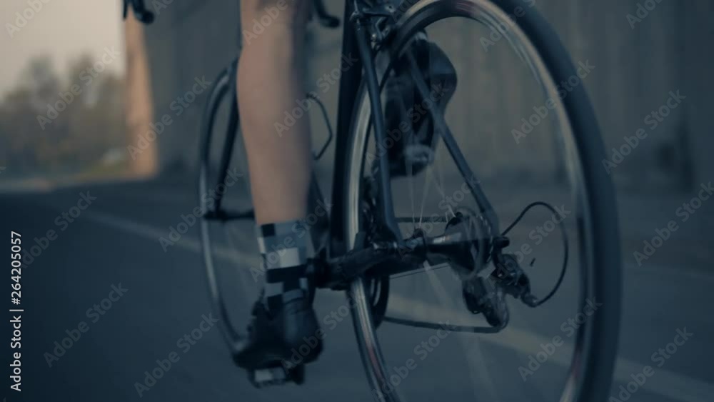 Cyclist Legs Pedaling Uphill.Close Up Strong Legs Bicyclist.Close Up Cyclist Focus On Muscular Legs Pedalling Bicycle In Uphill.Low Angle Tracking Shot Cyclist Athlete Legs.CloseUp Male Cyclist Riding Cyclist Legs Pedaling Uphill.Close Up Strong Legs Bicyclist.Close Up Cyclist Focus On Muscular Legs Pedalling Bicycle In Uphill.Low Angle Tracking Shot Cyclist Athlete Legs.CloseUp Male Cyclist Riding
