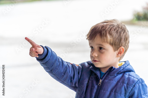 Small child pointing at something