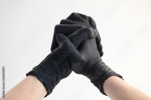 Women hand in black gloves nitril
