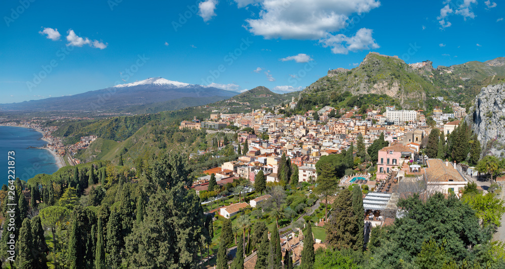 Taormina and Mt. Etna volcano in the bacground - Sicily.