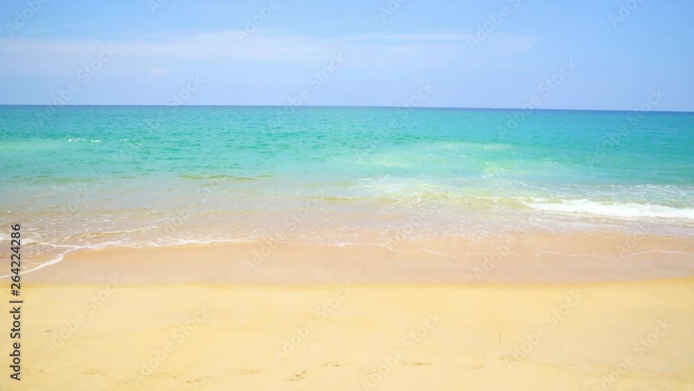 Mai Khao Beach, Phuket THAILAND Clean beautiful sand and the bright sea with sky background. Mai Khao Beach, Phuket THAILAND Clean beautiful sand and the bright sea with sky background.