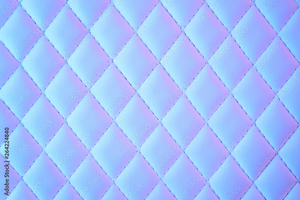 Fototapeta Pikowana skóra PU w geometrycznym wzorze diamentu w świetle neonowym