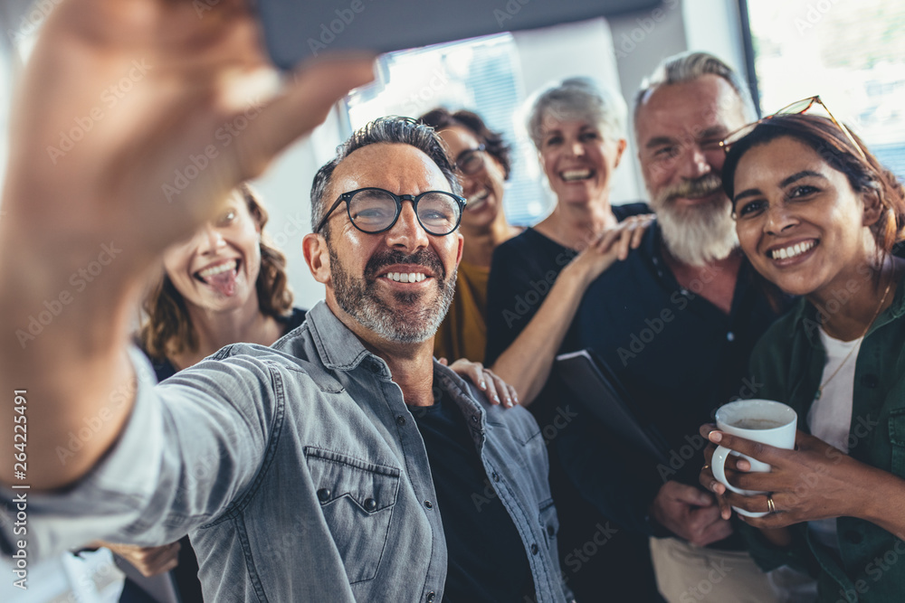 Group selfie in office Group selfie in office