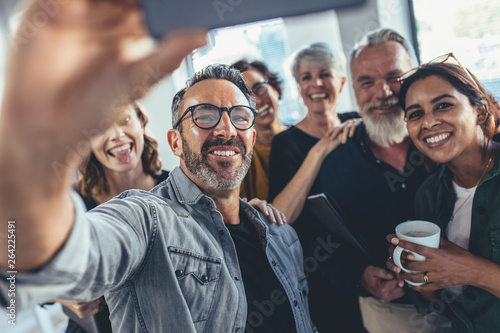 Group selfie in office © Jacob Lund