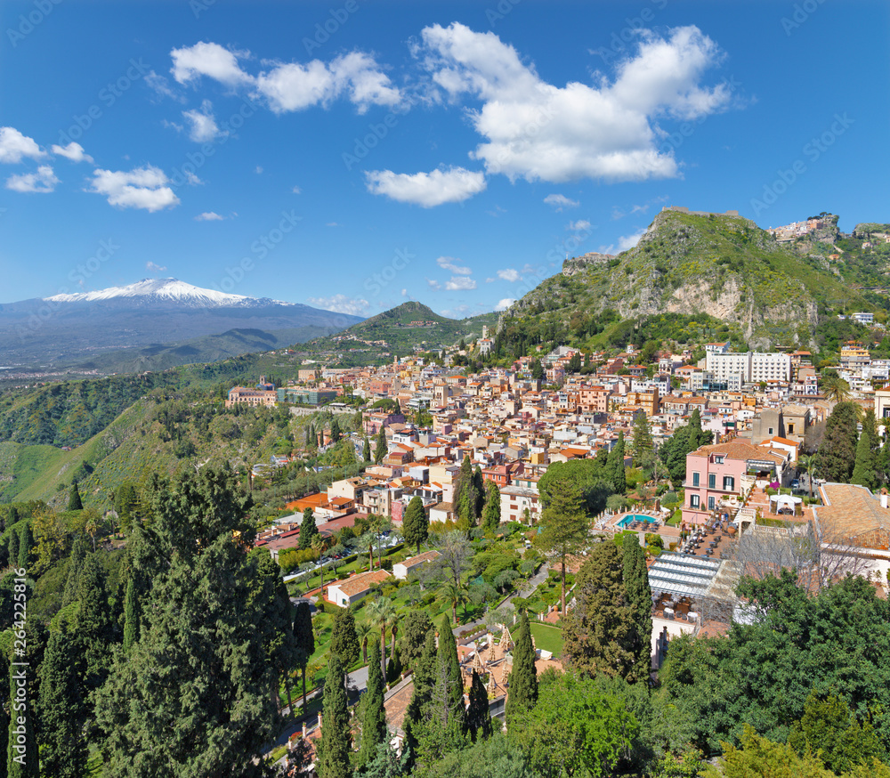 Taormina and Mt. Etna volcano in the background - Sicily.