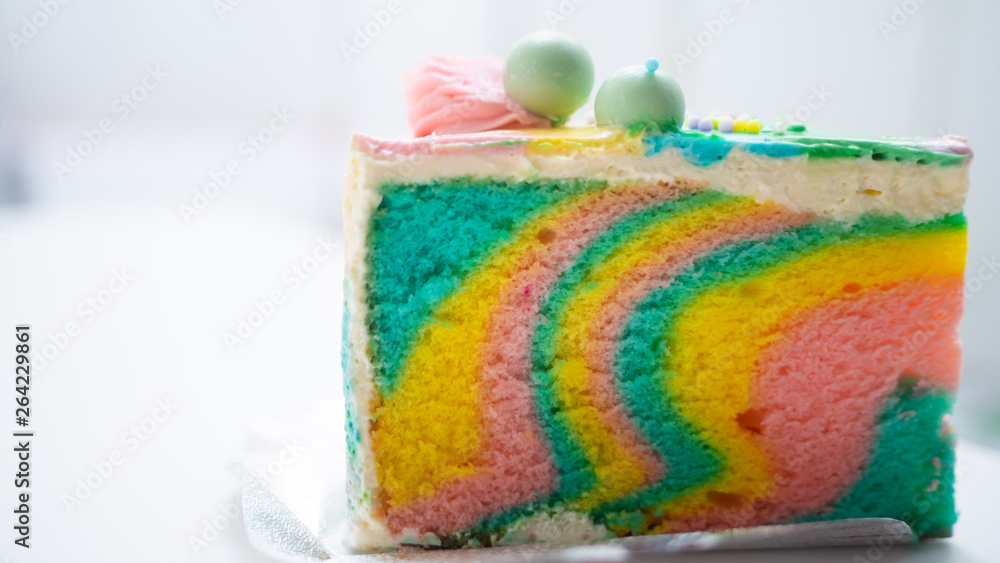 Rainbow Cake cream placed on a white background. Rainbow Cake cream placed on a white background.