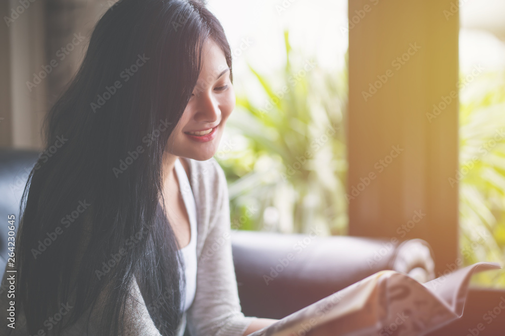 Portrait of woman reading a book at coffee cafe Portrait of woman reading a book at coffee cafe