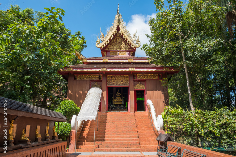 The ordination hall that contained emerald Buddha image in Wat Phra Kaew an iconic landmark temple in Chiang Rai province of Thailand. The ordination hall that contained emerald Buddha image in Wat Phra Kaew an iconic landmark temple in Chiang Rai province of Thailand.