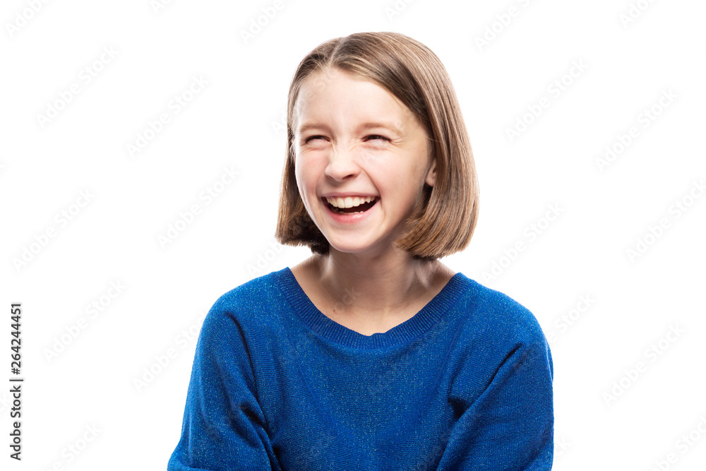 Cute teen girl laughs, closing her eyes. Close-up. Isolated on a white background Cute teen girl laughs, closing her eyes. Close-up. Isolated on a white background