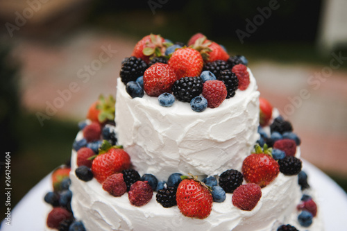 Wedding Cake with Berries. Wedding rustic cake with fruits