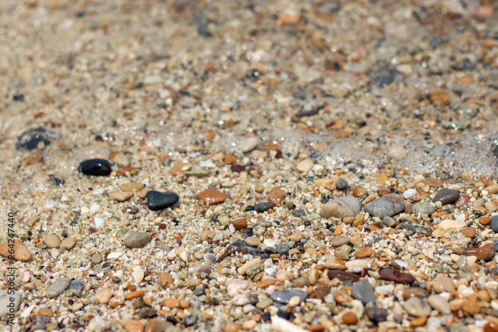 Stone gravel, beach area stone gravel several colors and coral fragments at have shape rounded round caused because of sea waves make give objects bump together all the time cause beauty naturally. Stone gravel, beach area stone gravel several colors and coral fragments at have shape rounded round caused because of sea waves make give objects bump together all the time cause beauty naturally.