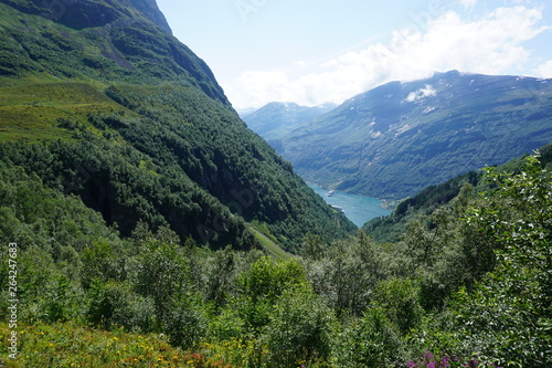 Geiranger fjord with blue sky and with cruise liners in Norway