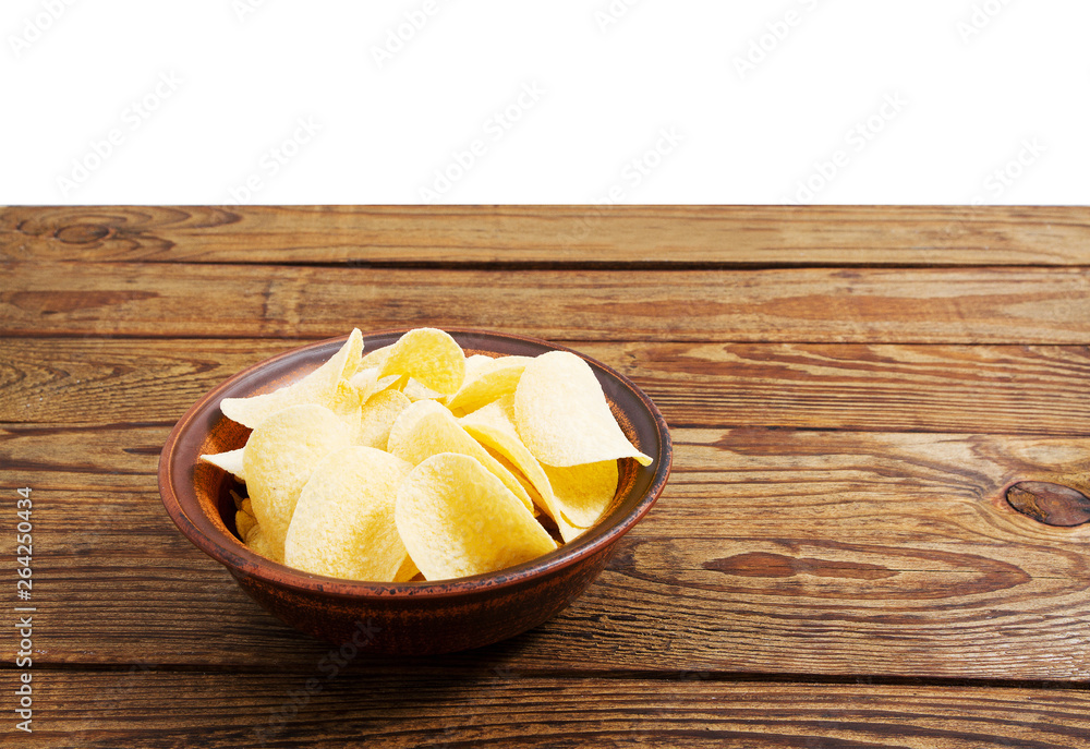 potato chips on empty wooden table isolated on white background copy space potato chips on empty wooden table isolated on white background copy space