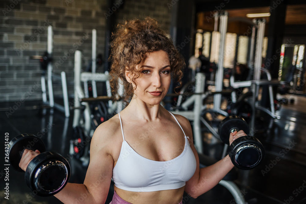 Handsome girl workout in gym Handsome girl workout in gym