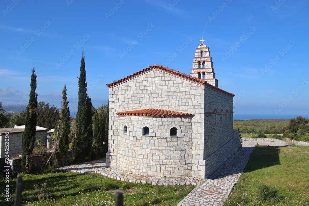 Stone church in the Inner Mani, besides the road.  Peloponnese, Greece, South-east Europe.