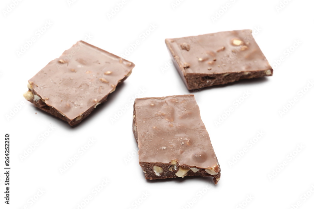 Chocolate bars with hazelnuts isolated on white background
