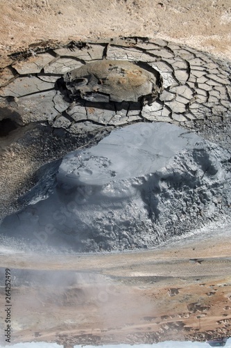 Seltun / Krysuvik (Krýsuvík): Steaming and bubbling geothermal mud pot with cracks and fissures in the ground photo