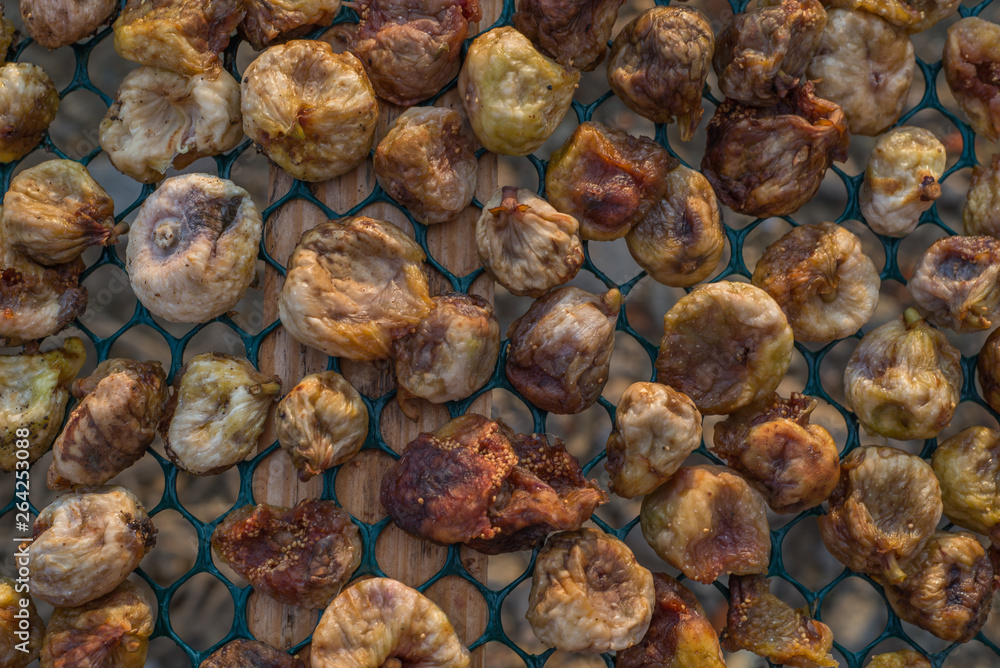 Dried figs background. Photo of dry, natural figs. Dried figs background. Photo of dry, natural figs.