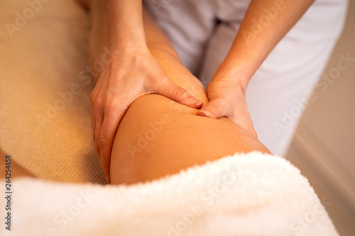 Anti cellulite massage for young woman in beauty salon