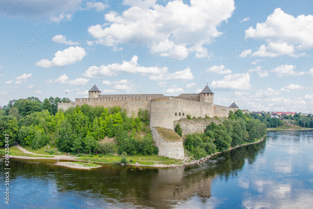 Ivangorod fortress on the Bank of the Narva river in the summer noon