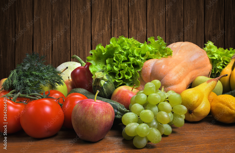 Fruit and vegetable crop on old wooden table Fruit and vegetable crop on old wooden table